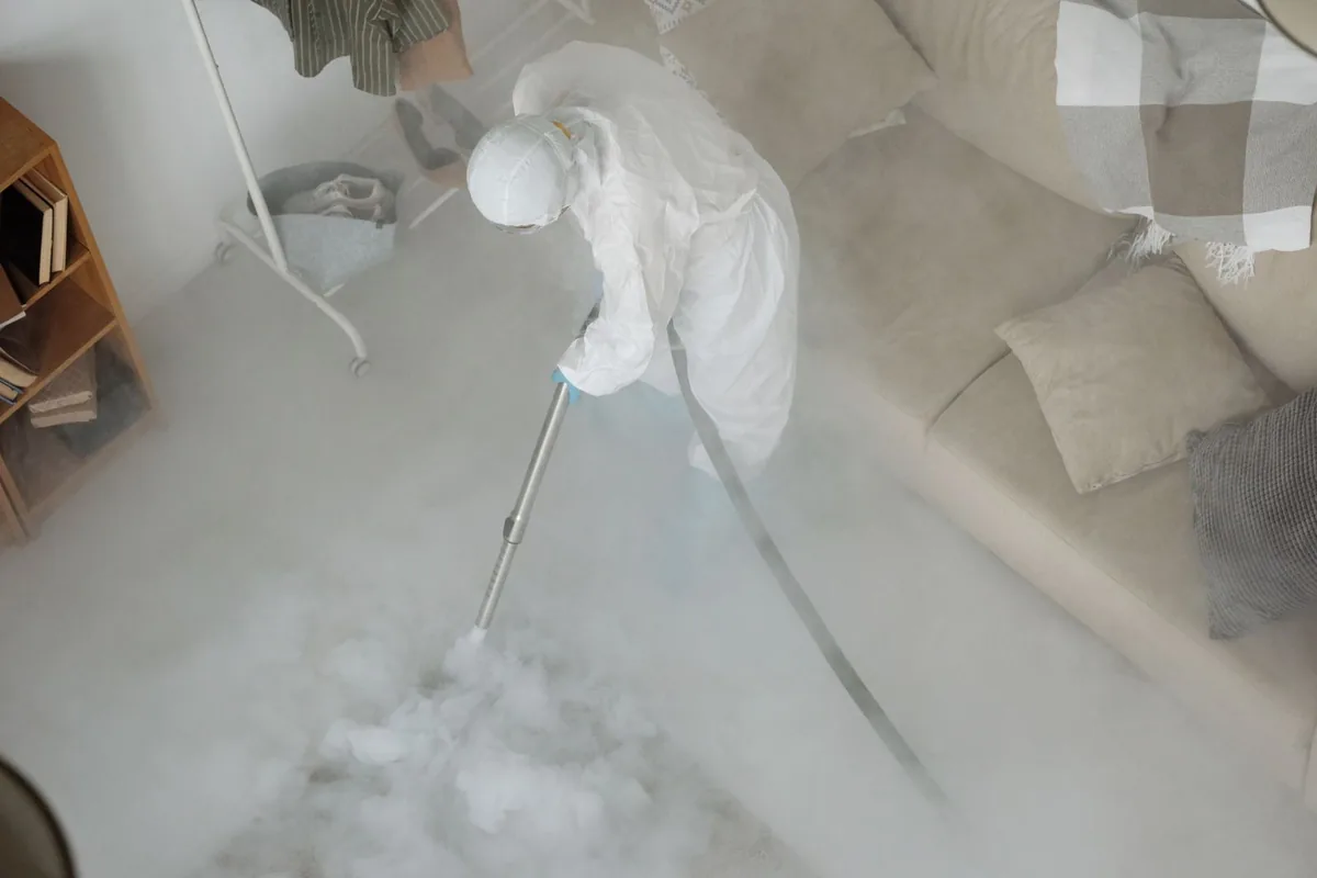 Biohazard cleanup technician in protective equipment, Union, KY